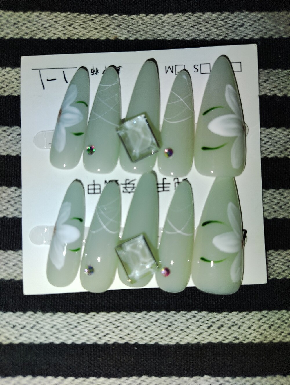 Handmade Soft Sage Stiletto Press-On Nails with White Floral Accents Size L